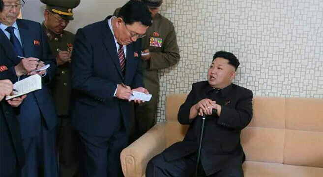 Kim Jong Un reappears in state media with cane