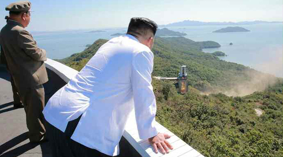 Kim Jong Un supervises satellite rocket engine test: State media