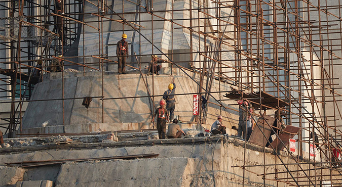 Despite reported flood construction halt, work continues on Ryomyong Street