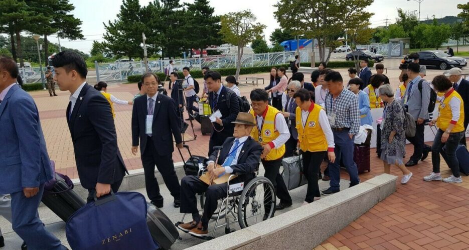 Two Koreas begin first family reunions in almost three years