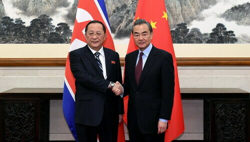 China reiterates support for DPRK’s “new strategic line” at Ri, Wang meeting