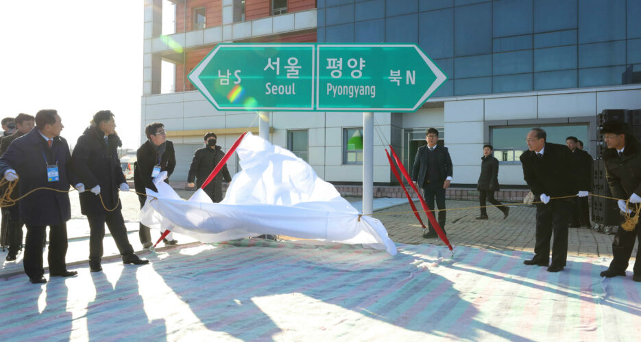 At ceremony, two Koreas vow to push for road, rail cooperation with “determination”