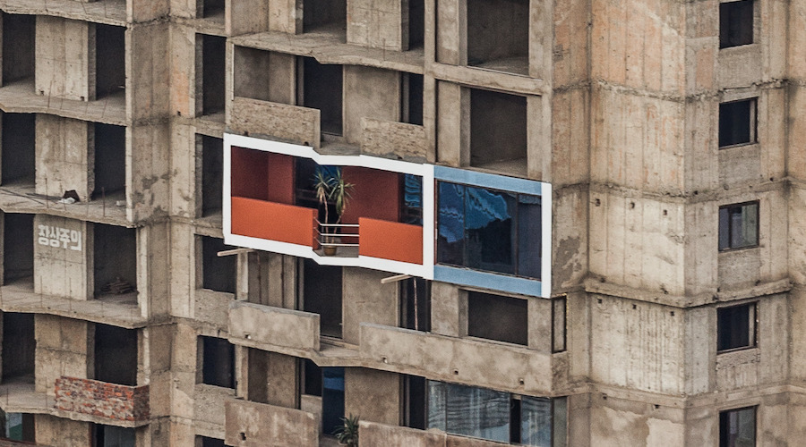 Under-construction Pyongyang tower block seen fitted with model apartment