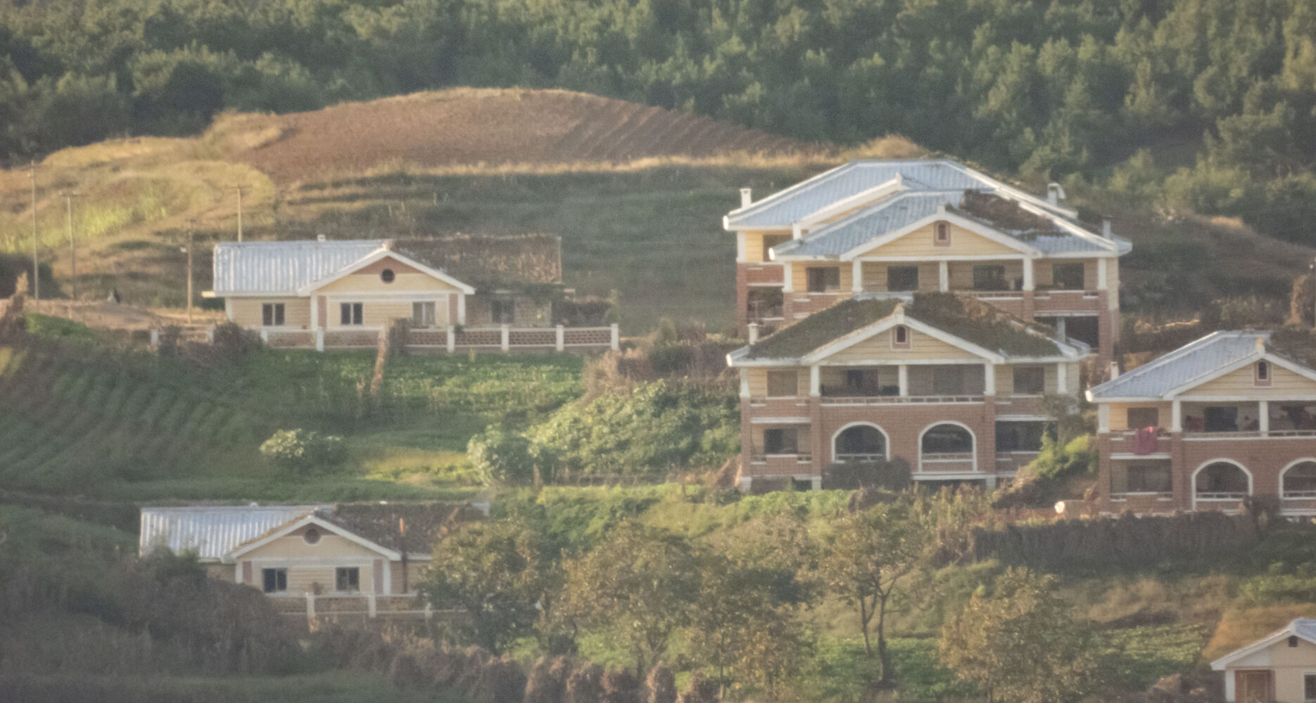 Photos: North Korean harvest, new homes as seen from South’s new border ...