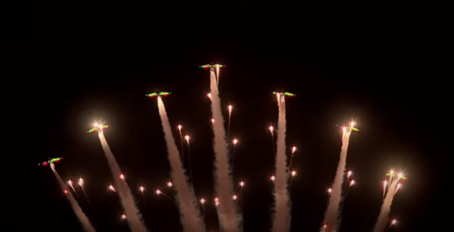 Illuminated jets seen above Pyongyang in late-night flyover