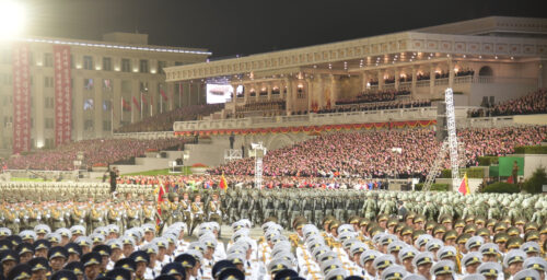 No obvious parade sounds in Pyongyang, but Kim Il Sung square illuminated