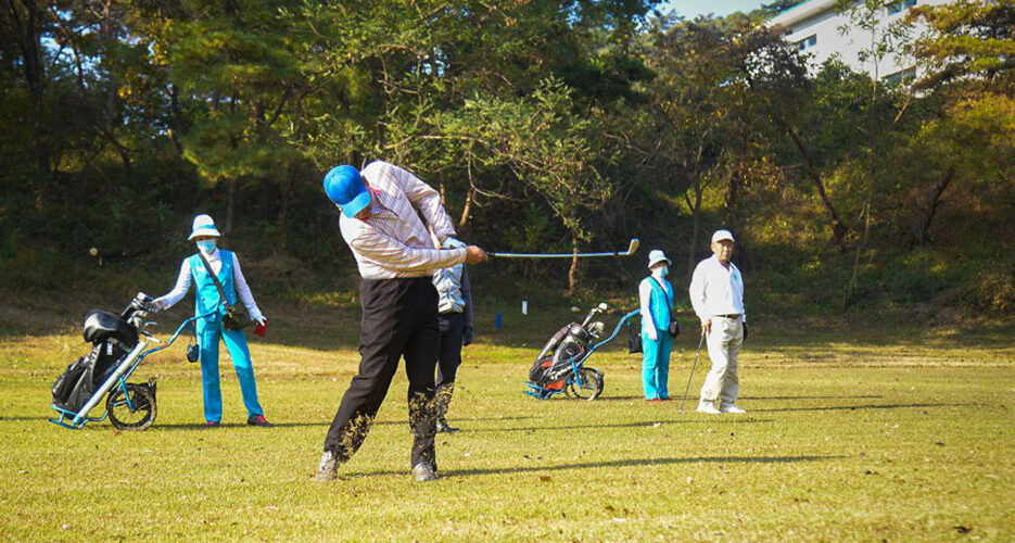 North Korean elites tee off at golf event despite country’s economic woes