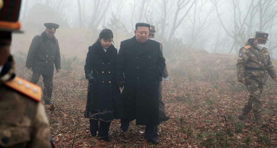 Kim Jong Un and daughter watch missile test simulating nuclear attack on US, ROK