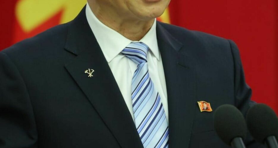 North Korean officials appear wearing Kim Jong Un loyalty badges for first time