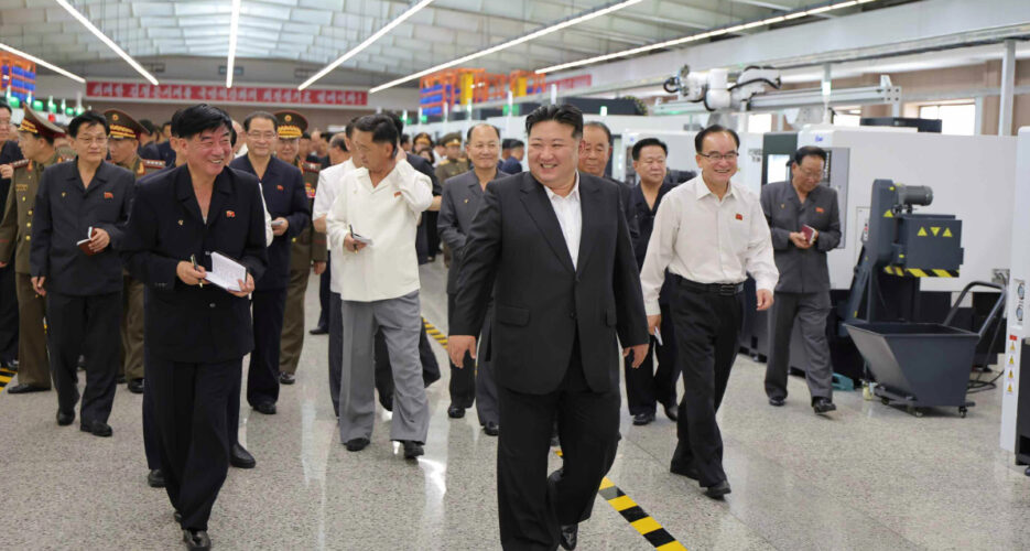 Kim Jong Un tours new weapons factory with party plenum attendees