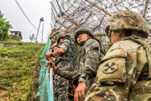 Explosions ring out from DMZ as North Korea clears land with dynamite