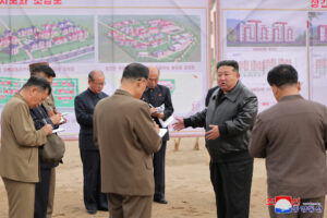 Kim Jong Un calls out problems rebuilding flood-hit villages near weapons plants