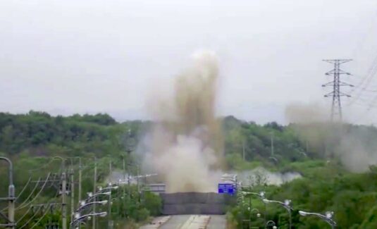 North Korea blows up inter-Korean roads, leading South to fire warning shots