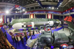 Kim Jong Un shows off North Korea's new drones, largest ICBMs at weapons expo