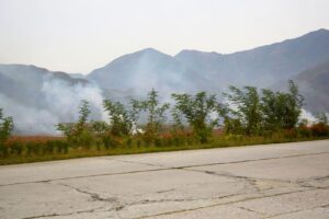 North Korea carries out controlled burns at main airport as fires burn in South