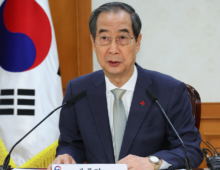 Han Duck-soo calls for stronger ties with US and Japan to counter North Korea