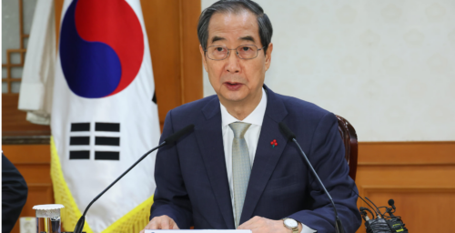 Han Duck-soo calls for stronger ties with US and Japan to counter North Korea