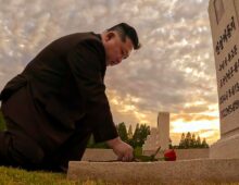 Kim Jong Un kneels at the grave of his late mentor for third straight year