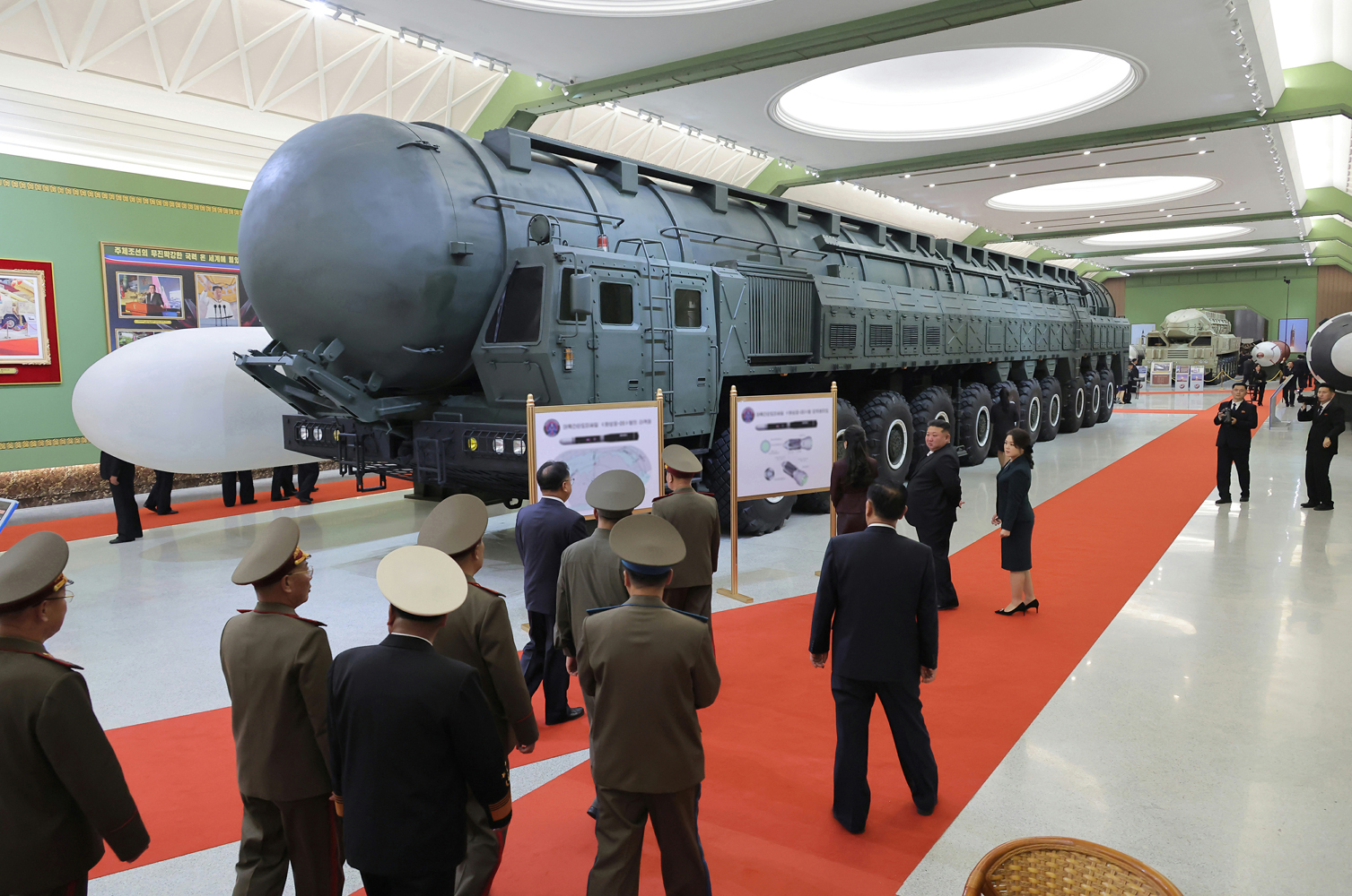 Kim Jong Un opens new weapons museum as North Korea claims missile test success
