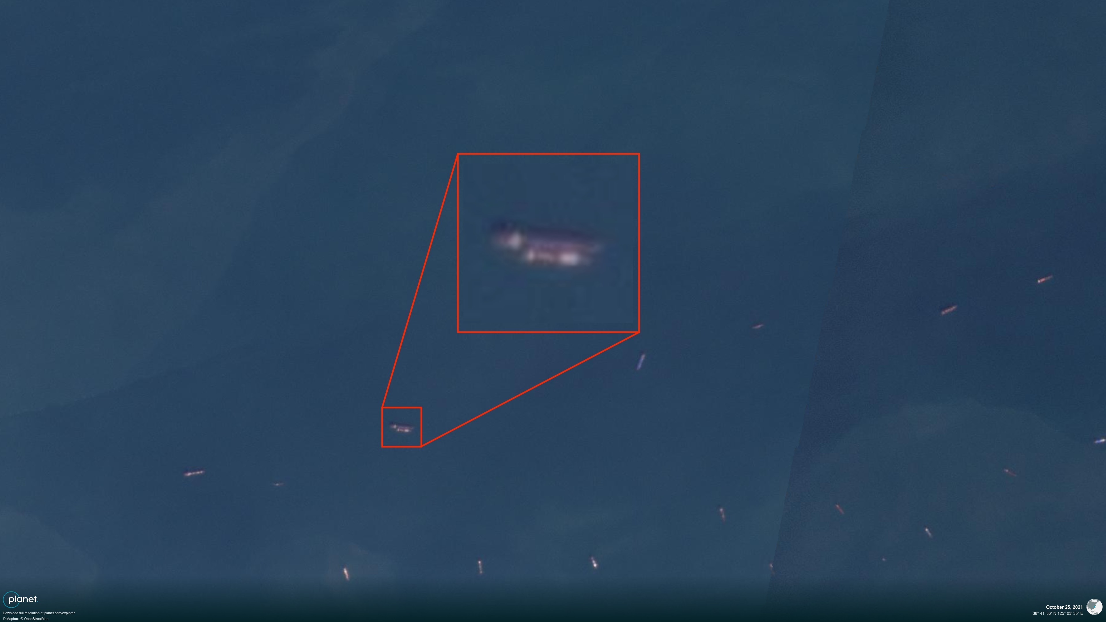 An approximately 140-meter-long vessel rendezvous with an 80 meter-long vessel outside Nampho on Oct. 25, 2021. The lack of distinct, compartmentalized cargo holds on the top vessel suggests it is an oil tanker, although high-resolution imagery is needed to confirm. | Image: Planet Labs PBH (edited by NK Pro)