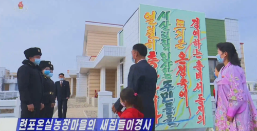 State media review: North Korea rewards greenhouse workers with new homes